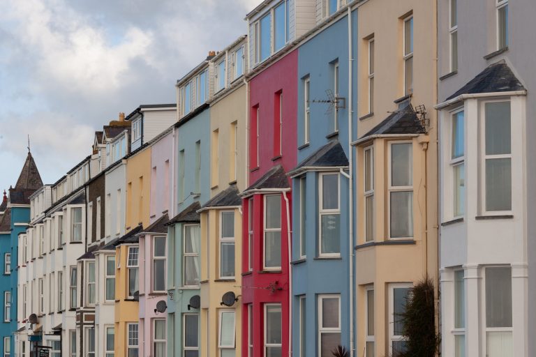 A row of different coloured houses